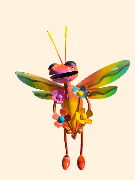 Libélula con flores